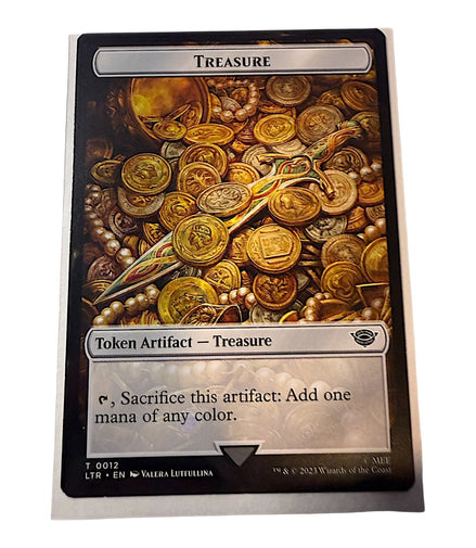 Magic: The Gathering card featuring Treasure token with gold coins and artifacts