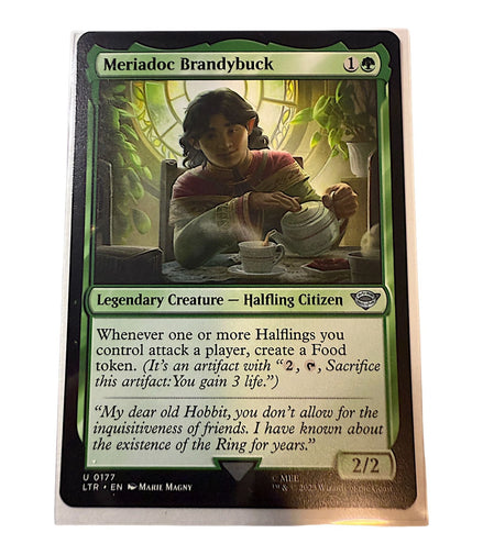 Magic: The Gathering card featuring Meriadoc Brandybuck, a legendary Halfling Citizen with a 2/2 power and toughness.