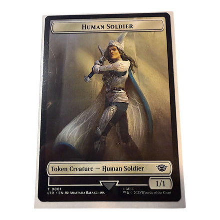 Magic The Gathering Human Soldier token card featuring a warrior in armor