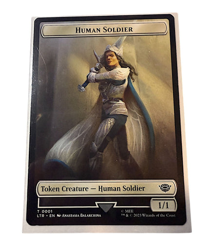 Magic The Gathering Human Soldier token card featuring a warrior in armor
