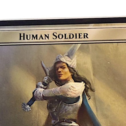 Magic The Gathering Human Soldier token card featuring a warrior in armor
