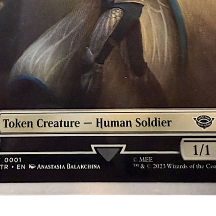 Magic The Gathering Human Soldier token card featuring a warrior in armor