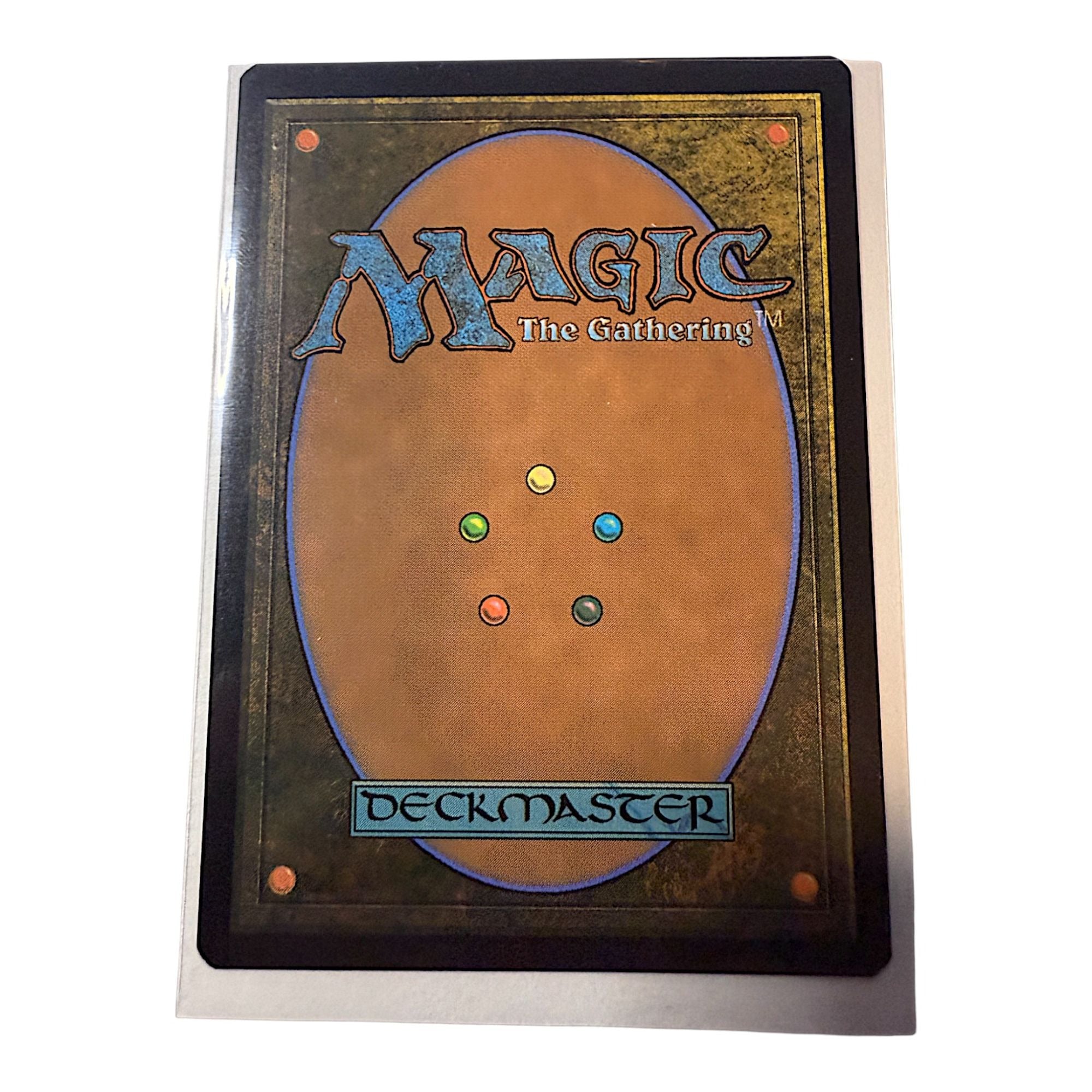 Back of Magic The Gathering card with Deckmaster logo