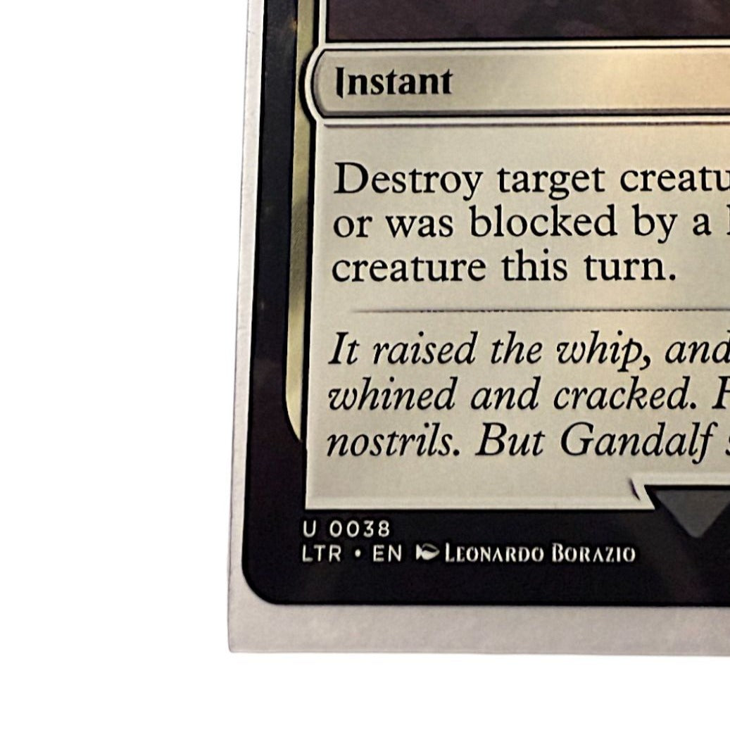 Corner view of Magic The Gathering card showing card number and series