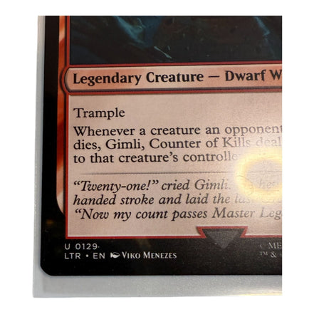 Back of a Magic: The Gathering card showing the Deckmaster logo.