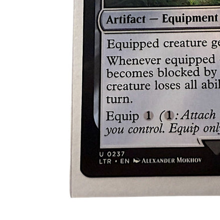 Magic: The Gathering Barrow-Blade card with strategic gameplay text