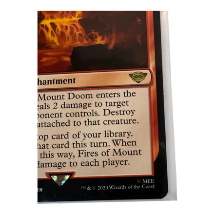 Close-up of Fires Of Mount Doom card description and enchantment details