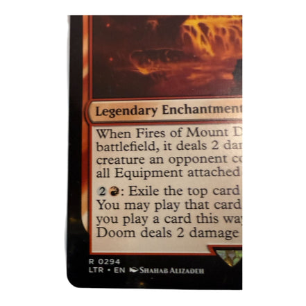Close-up of Fires Of Mount Doom card artist and copyright details
