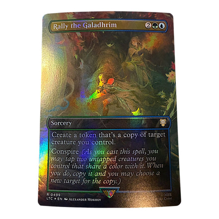 Magic: The Gathering Rally The Galadhrim foil sorcery card with vibrant artwork and text detailing its abilities.