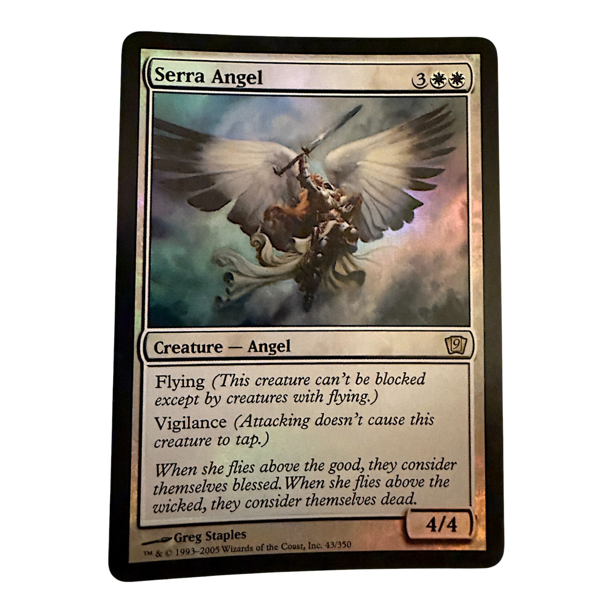 Magic The Gathering Serra Angel card featuring flying and vigilance abilities