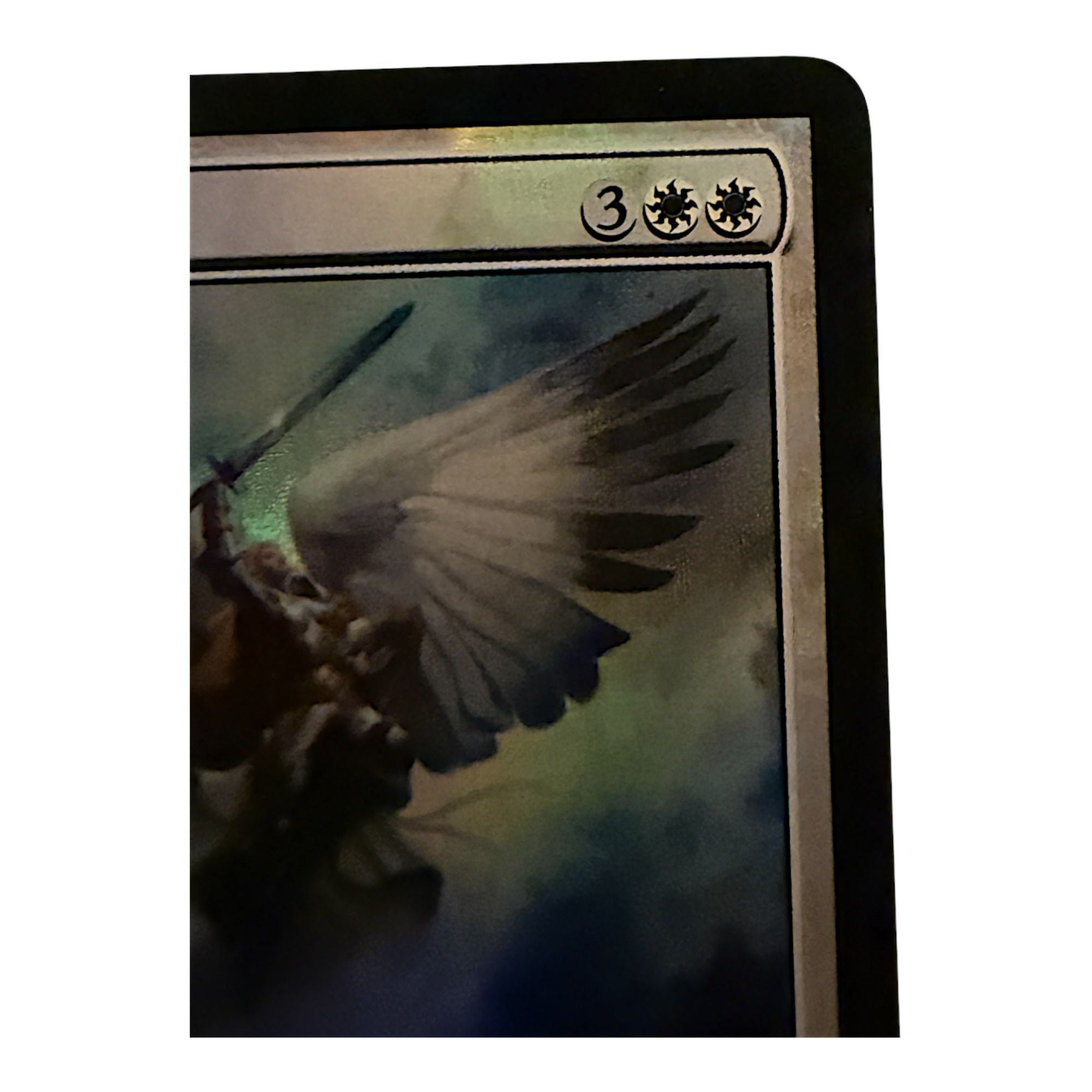 Close-up of Serra Angel card mana cost and abilities