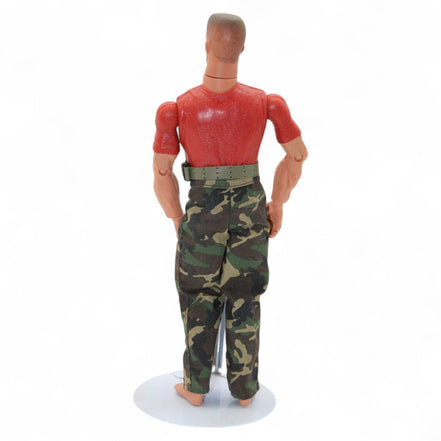 Close-up of marine action figure's red shirt with marine slogan