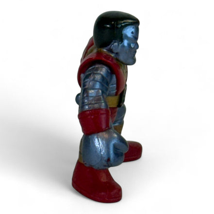 Colossus figure from the side highlighting muscular build