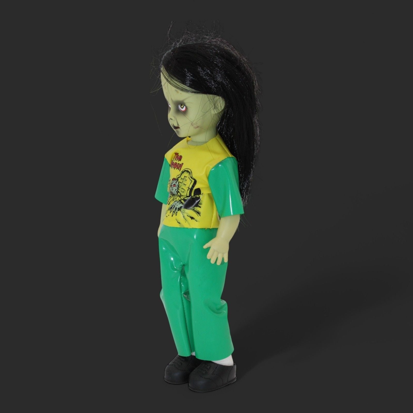 Gabriella Living Dead Doll in green outfit with black hair, side view