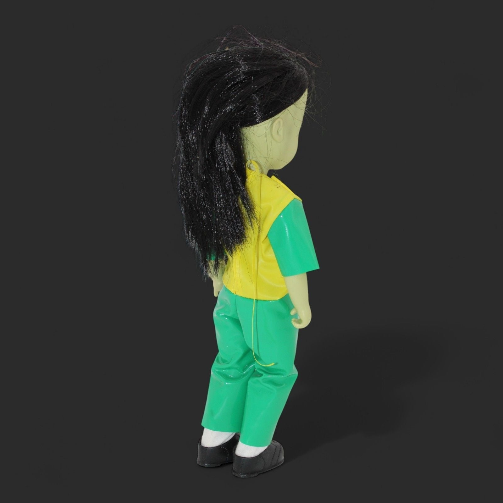 Gabriella Living Dead Doll in green outfit with black hair, angled view