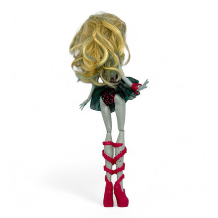 Back view of Monster High Lagoona Blue Doll showcasing blonde hair and pink heels