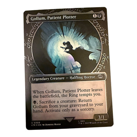 Magic: The Gathering Gollum Patient Plotter card featuring a legendary halfling horror creature.
