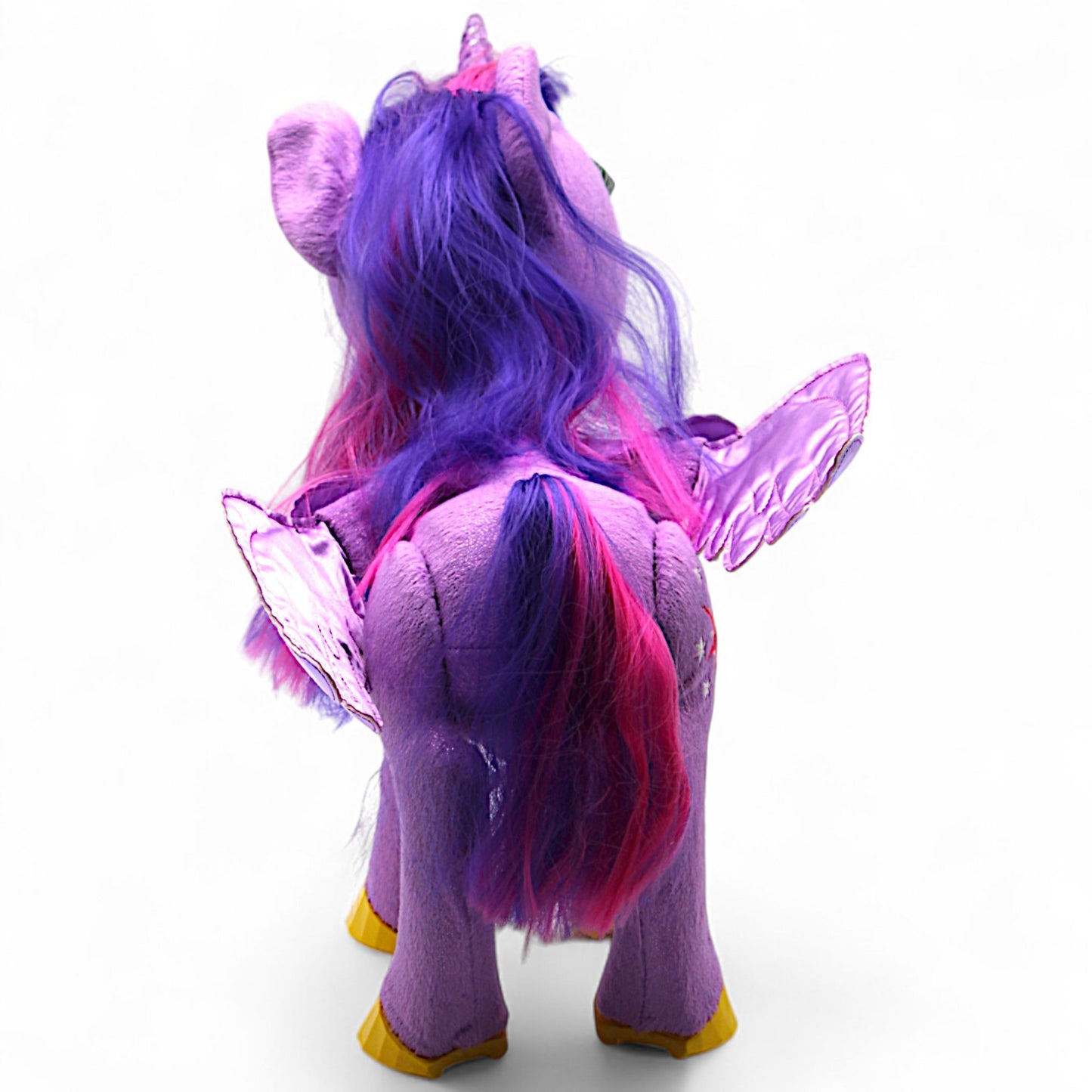 A talking and singing Princess Twilight Sparkle plush by Hasbro (My Magical Princess), with battery‑operated wings, horn light and tiara, interactive for play.
