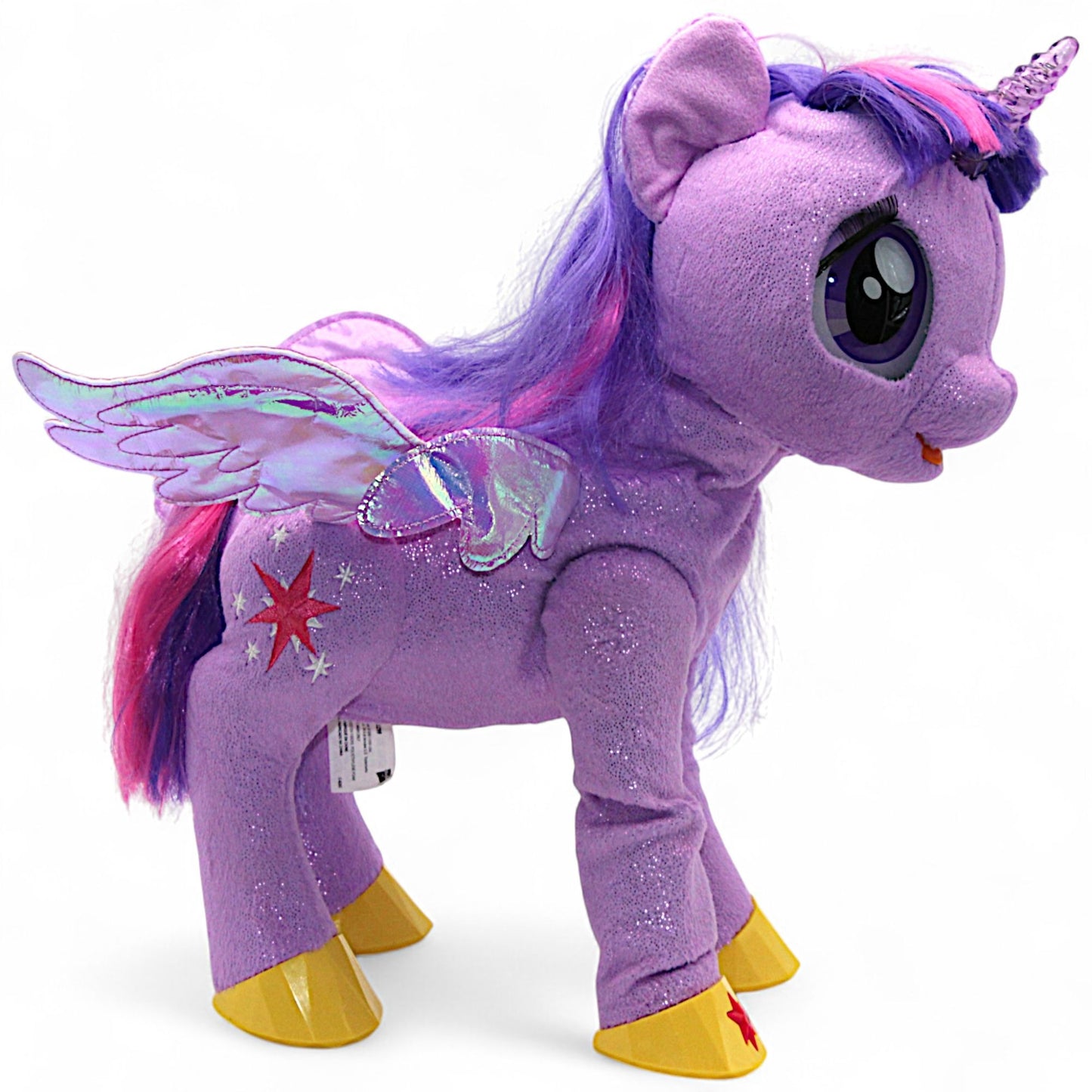 A talking and singing Princess Twilight Sparkle plush by Hasbro (My Magical Princess), with battery‑operated wings, horn light and tiara, interactive for play.
