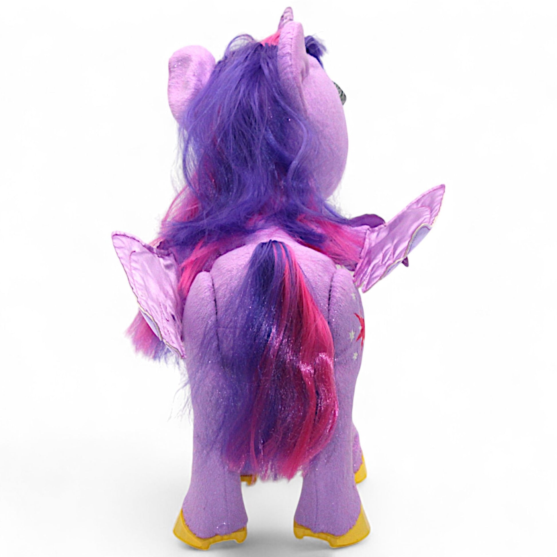 A talking and singing Princess Twilight Sparkle plush by Hasbro (My Magical Princess), with battery‑operated wings, horn light and tiara, interactive for play.
