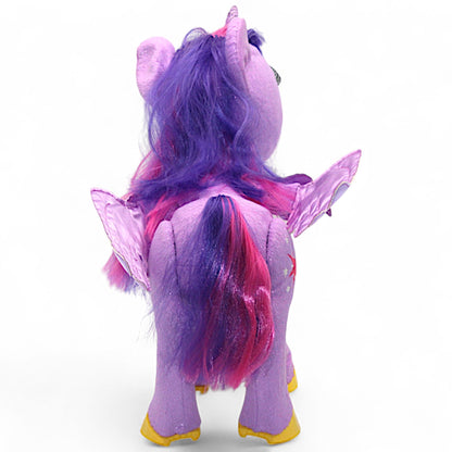A talking and singing Princess Twilight Sparkle plush by Hasbro (My Magical Princess), with battery‑operated wings, horn light and tiara, interactive for play.
