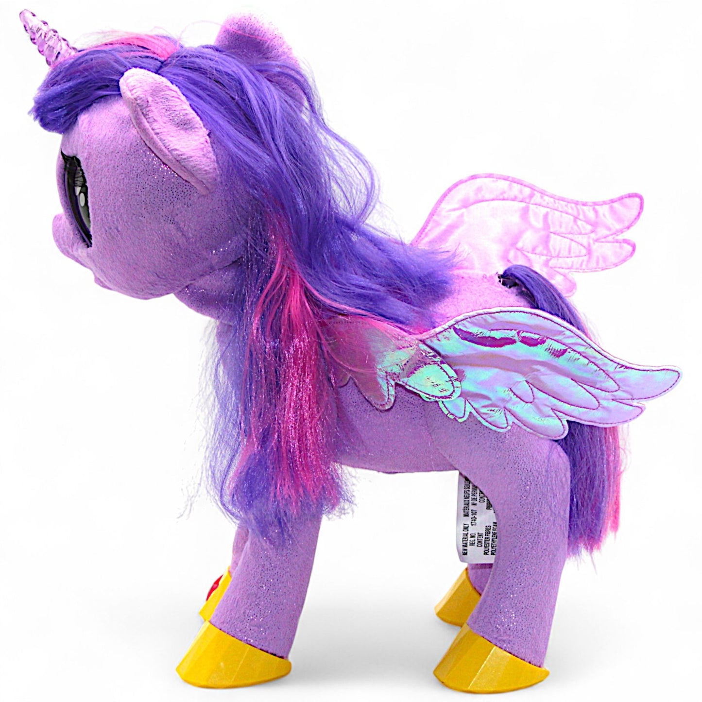 A talking and singing Princess Twilight Sparkle plush by Hasbro (My Magical Princess), with battery‑operated wings, horn light and tiara, interactive for play.
