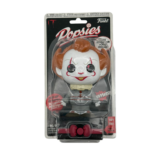 front view of Pennywise Funko Pop Popsies figure in sealed packaging with pop-up message

