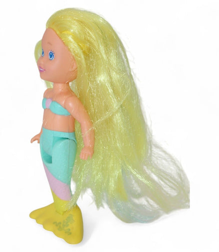 Side view of Playskool mermaid doll showing vibrant tail