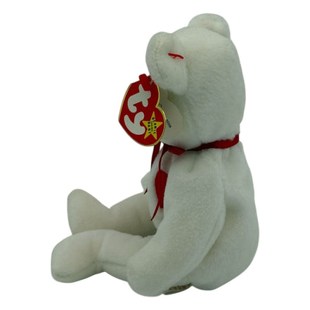 Side view of TY Beanie Baby Valentino Bear showing tag and red bow