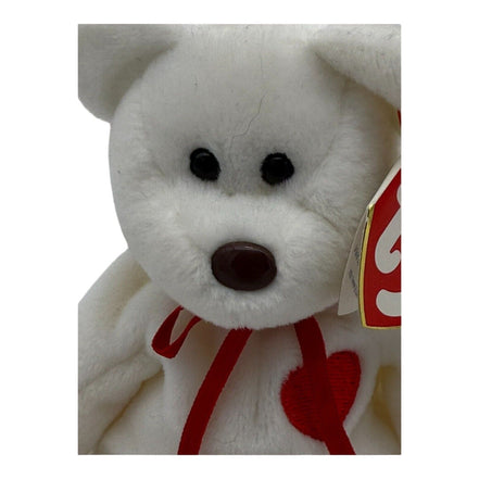 Close-up of TY Beanie Baby Valentino Bear's face and red heart