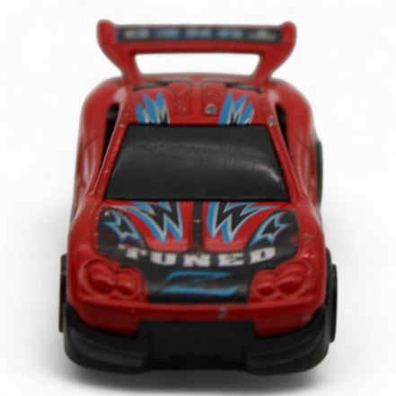 Side view of Yat Ming No. 838 red diecast car showing its sleek design