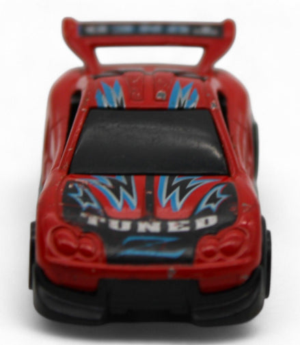 Side view of Yat Ming No. 838 red diecast car showing its sleek design