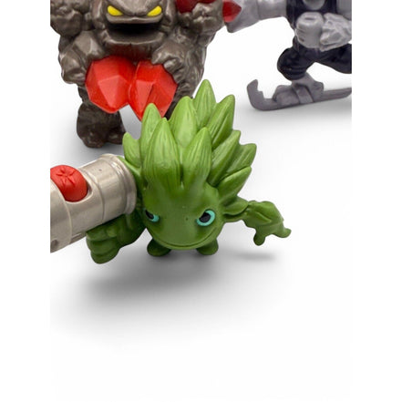 Green Skylanders Happy Meal toy figure with a cannon