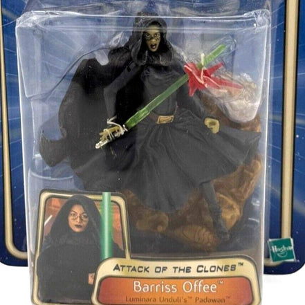 Close-up of Barriss Offee action figure with lightsaber