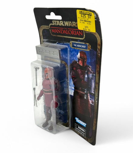 Side view of Star Wars Mandalorian Armorer action figure
