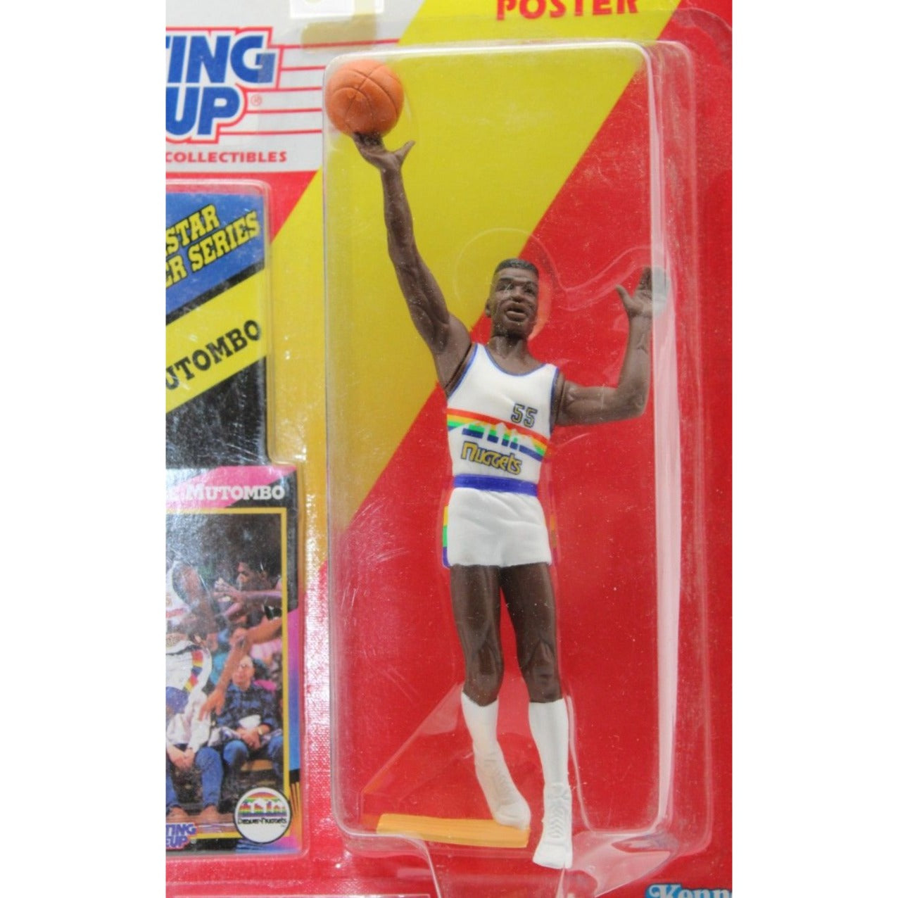 Starting Lineup Dikembe Mutombo NBA action figure by Kenner features Denver Nuggets uniform, trading card, and 11"x14" poster, sealed in original packaging.
