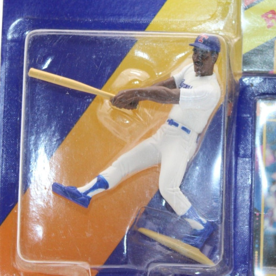 A mint 1992 Kenner Starting Lineup Ruben Sierra action figure in Texas Rangers uniform, sealed with special series poster and collector card.
