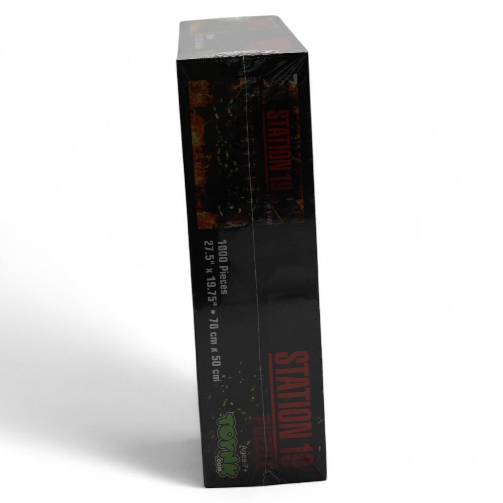 Side view of Station 19 puzzle box highlighting size and age suitability
