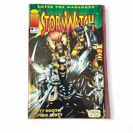A mint condition Image Comics Stormwatch issue 4 comic book titled “Enter the Warguard” featuring powerful Warguard characters on cover art by Brett Booth and Trevor Scott.
