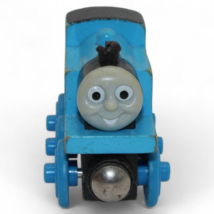 Front view of Thomas the Tank Engine wooden toy with smiling face