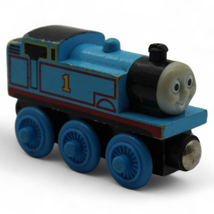 Side view of Thomas the Tank Engine wooden toy showing six wheels