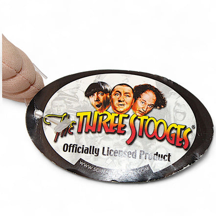 Close-up of the red and white striped outfit on the Three Stooges Larry plush