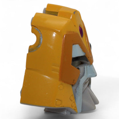 Side view of Transformers Armada Unicron face piece, yellow and gray