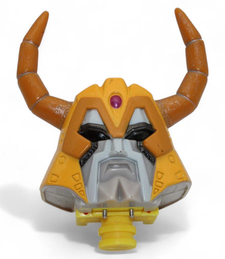 Front view of Transformers Armada Unicron headpiece replacement in yellow and brown