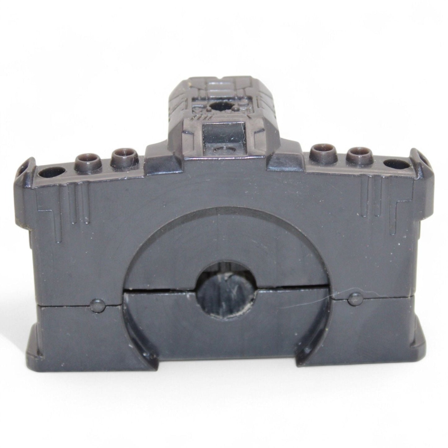 Close-up of durable black plastic hip section for Unicron