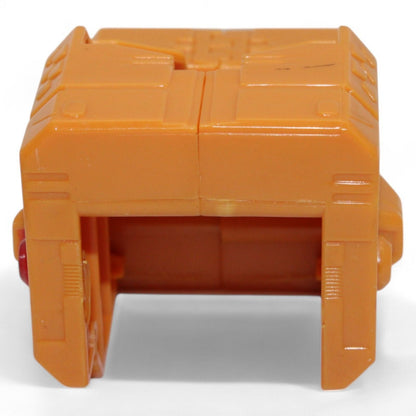 Side view of orange replacement part for Unicron figure