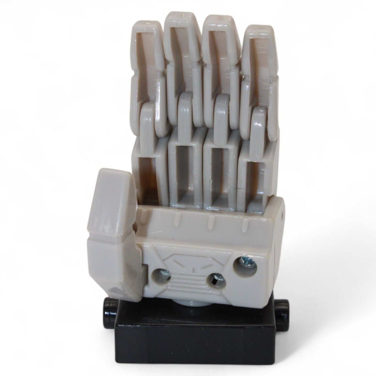 Back view of Transformers Armada Unicron left hand replacement part in gray and black