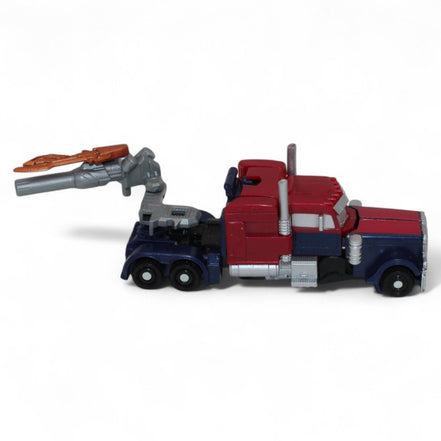 Transformers Dark of the Moon Battle Steel Optimus Prime action figure in robot mode, incomplete with no accessories
