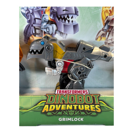 Transformers Dinobot Adventures Grimlock, Predaking, and Snarl figures in packaging