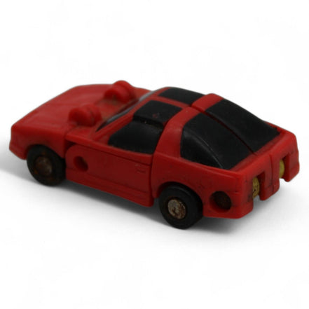 Vintage red convertible car form of the Transformers G1 Micromasters Roadhandler